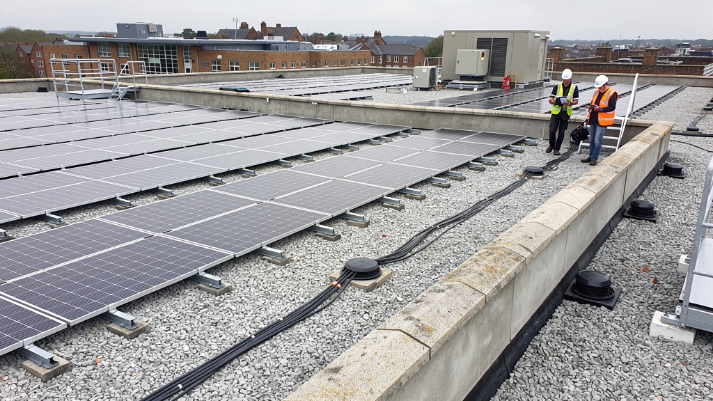 Commercial building flat roof survey with solar panels and parapet assessment