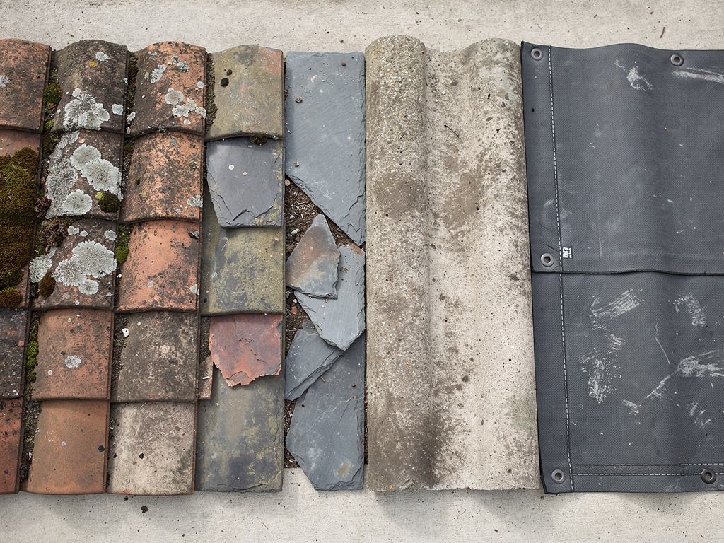 UK roof materials comparison showing slate, clay tiles, concrete and flat roof membrane – Roof Surveyor London